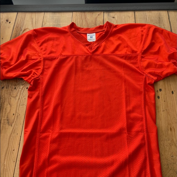 Bundle of practice football gear.  4 practice jerseys, 4 black socks & chinstrap - Picture 7 of 7